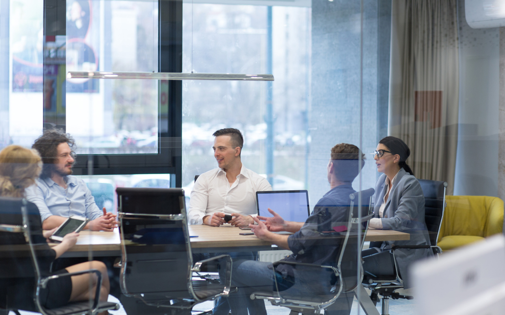 Consulting Team Talking In A Meeting