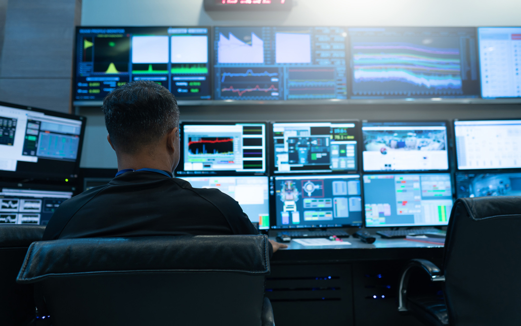 Goverment Worker Looking At Screens