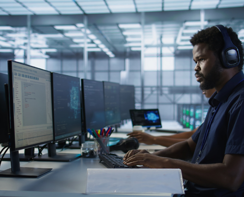 Person Looking At Computer In Office