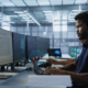 Person Looking At Computer In Office